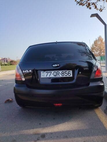 diskilər: Kia Rio – qara rəng, hetçbek kuzov. Xarici:yoxdı - Qara rəngli kuzov — 5