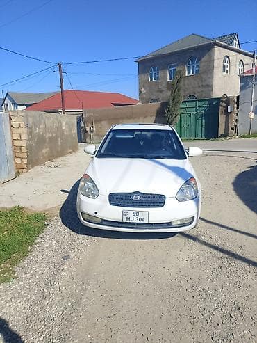 kia clarus 1997: Hyundai Accent: 1.6 l | 2009 il Sedan — 5