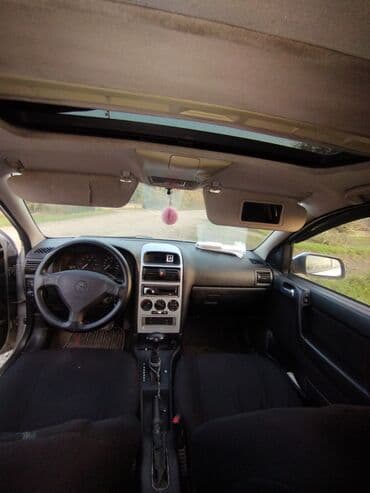 nissan note motor: Opel Astra: 1.6 l | 1999 il Sedan — 13