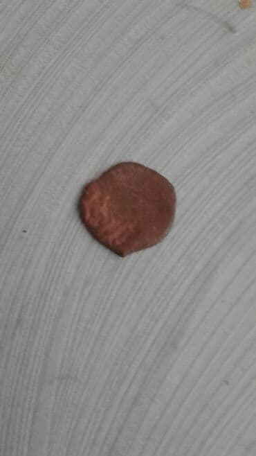 CD, DVD disklər və kassetlər: Məhsul: Köhnə mis sikkə (4 ədəd) Təsvir: - Material: mis - Say: 4 — 8