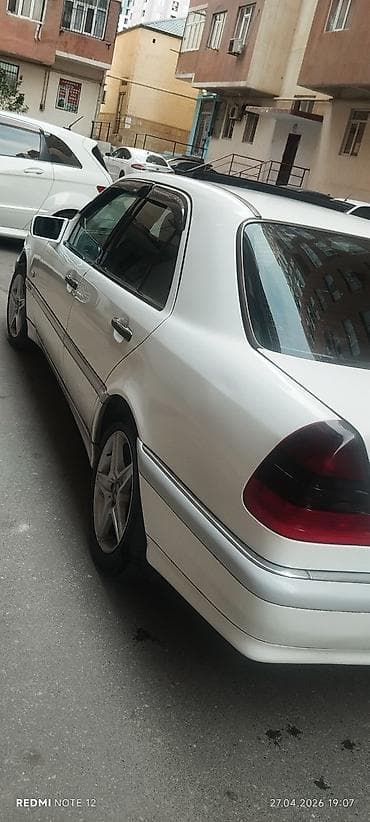 04 sat: Mercedes-Benz C 200: 2 l | 1997 il Sedan — 5