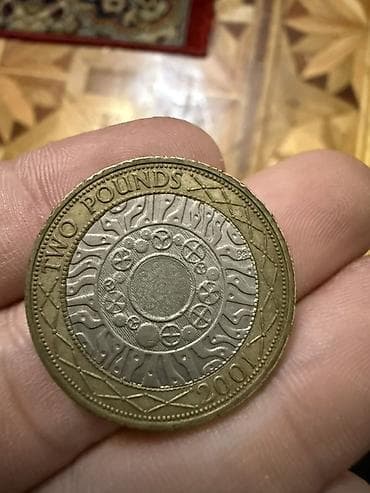 gitara simleri: 2 Funt sterlinq, 2001 il — 2