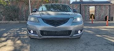 Mazda 323: 2.3 l | 2004 il Sedan