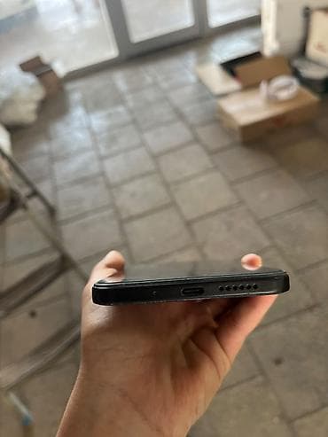 paltar yuyan 6 k: Xiaomi 15, 128 GB, rəng - Qara, 
 Sensor, Barmaq izi, Face ID — 3
