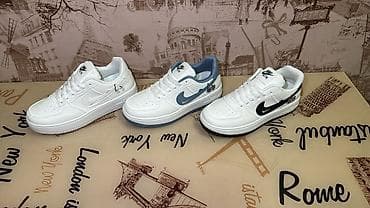 Ağ rəngli idman ayaqqabıları – klassik “Air” üslubu. Üç fərqli dizayn