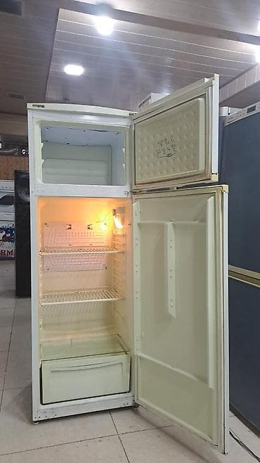 madem satisi: İki qapılı məişət soyuducusu - Yuxarıda dondurucu bölmə, aşağıda — 1