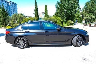 bmw e39 lip: BMW 5 Series sedan – qara metalik rəng, dinamiki və zərif dizayn — 3
