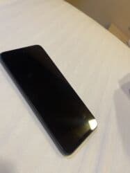 xiaomimi 10256 gb: Xiaomi 12, 128 GB, rəng - Qara, 
 Düyməli, Barmaq izi, İki sim kartlı — 3