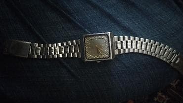 Metal korpuslu kvadrat üzülü qol saatı. - Korpus: kvadrat formalı