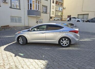 Volkswagen: Hyundai Elantra: 1.6 л | 2012 г. Седан — 2