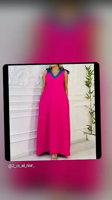 Qadın paltarının təsviri: - Uzun, A-kəsimli, rahat siluet - Parlaq — 1