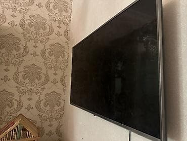 Elektronika: LG LED televizor - Ekran ölçüsü: təxminən 43–50 düym arası (divara — 2