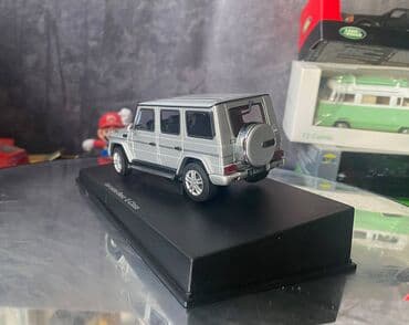 metbex tavan modelleri: Коллекционная модель Mercedes-Benz G-class W463 silver 2012 AutoArt — 20