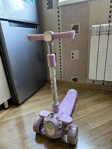 scooter uşaq ucun: Skuter. Hundurluye gore tenzimlenir. Musiqilidi. Qiymeti 30 azn — 1