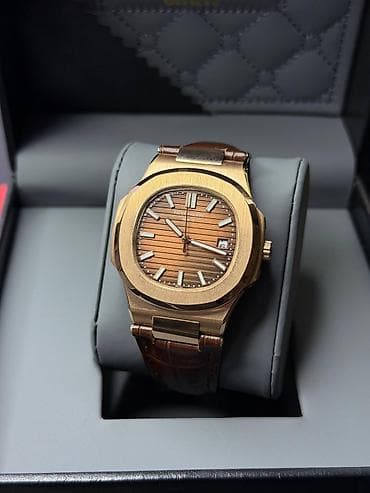 Patek Philippe Nautilus avtomatik kişi qol saatı - Korpus: qızılı — 2