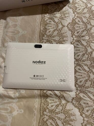 uşaqlar üçün planşetlər: Uşaqlar üçün nəzərdə tutulmuş NodiZZ Npad702 planşet. Ağ rəngli — 2