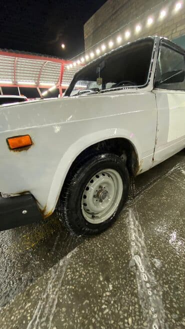 диски титановые ваз 2101 недорого: VAZ 2104 universal, ağ rəng. - Kuzov: 5 qapılı universal gövdə — 4