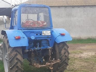 turbo az traktorlar: Mavi rəngdə kabinəli kənd təsərrüfatı traktoru. Xüsusiyyətlər: - — 3