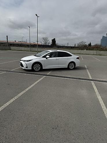 changan benni mini: Toyota Corolla sedan – ağ rəng, hibrid. Texnologiya və avadanlıq: - — 5