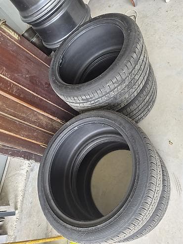 statır: BMW orijinal yüngül lehimli disklər və Yokohama şinləri dəsti - — 2