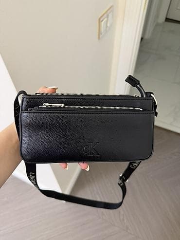 Original ck çantadir 100 azne almisam. 75 e satiram. İşlenmeyib