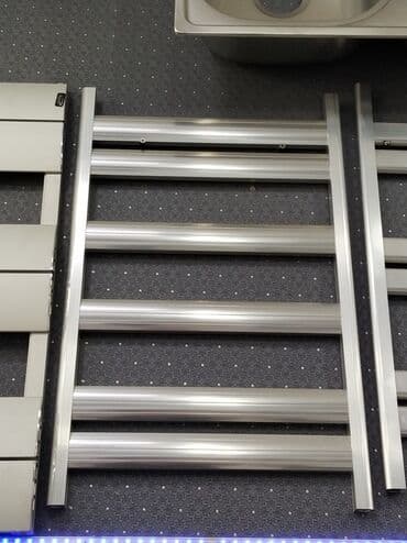 Paslanmayan poladdan divar tipli dəsmal qızdırıcısı / radiator. -