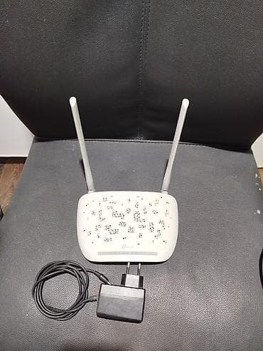 Modemlər və şəbəkə avadanlıqları: TP-Link Wi‑Fi router - Model: TP-Link (2 antenalı) - Rəng: ağ korpus — 1