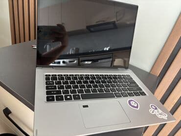 Printerlər: Acer noutbuku – gümüşü korpus, yüngül və nazik dizayn. Acer Prosesor — 6