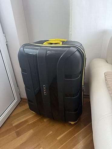 4 teker velosiped: Sərt korpuslu təkərli səyahət çantası (çamadan) 23 kg liqdir. Yaxşı — 2