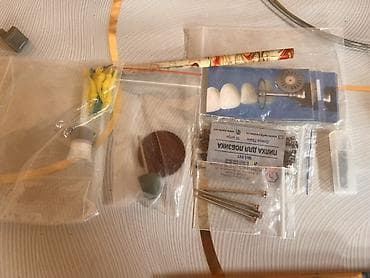 samdanlar ve saat: Dırnaq və diş texniki işlər üçün avadanlıq dəsti. Dəstə şəkillərdə — 10