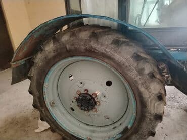 reduktor sürətlər qutusu: Mavi rəngli kabinalı təkərli traktor - Güclü dizel mühərrik (şəkildə — 6