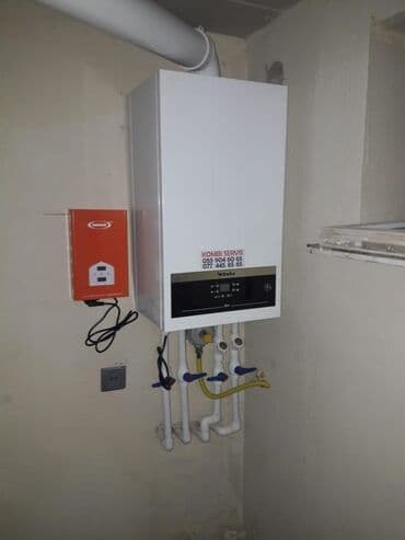 мастер по ремонту газовых колонок: Kombi çəkilişi qurasdirilmasi. Santexnikaya aid butun iwler Qaz — 1