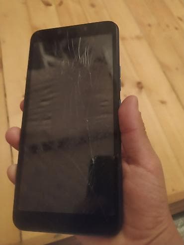 honor magic 6 pro azerbaycan: Smartfon – mavi rəng, arxa barmaq izi skaneri və şaquli yerləşdirilmiş — 1