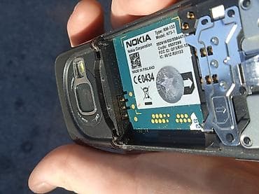 телефон fly ff247 black: Nokia N73, цвет - Черный, Кнопочный — 9