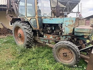 traktör satış: Universaldır: ön qreyder bıçağı və arxa ekskavator kovası olan təkərli — 2