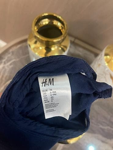 polo kurtka: 1ci papaq H&M firmasidir. 6/7 aya kimi. ikinci papaq Disneyindir — 2