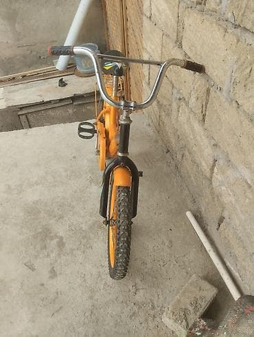 Uşaq velosipedi – narıncı rəng - Ölçü: təxminən 16" təkərlər (uşaqlar