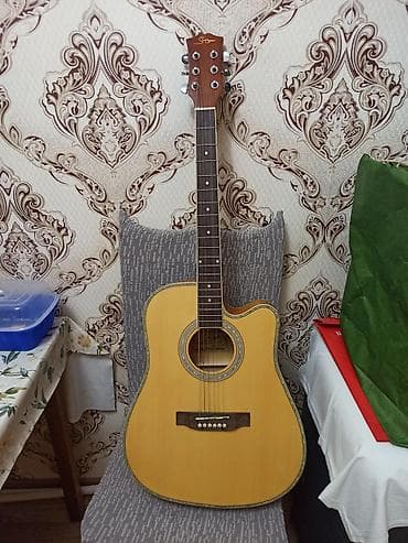 gitara temiri: Smiger Gah61n Akustik gitara satılır. Az istifadə olunub. Sınığı — 3