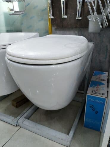 Asma tipli sanitar qovşaq (divara bərkidilən unitaz) - Müasir oval