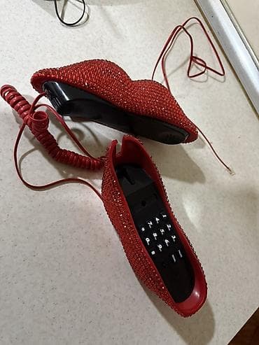 Stasionar telefon Simli