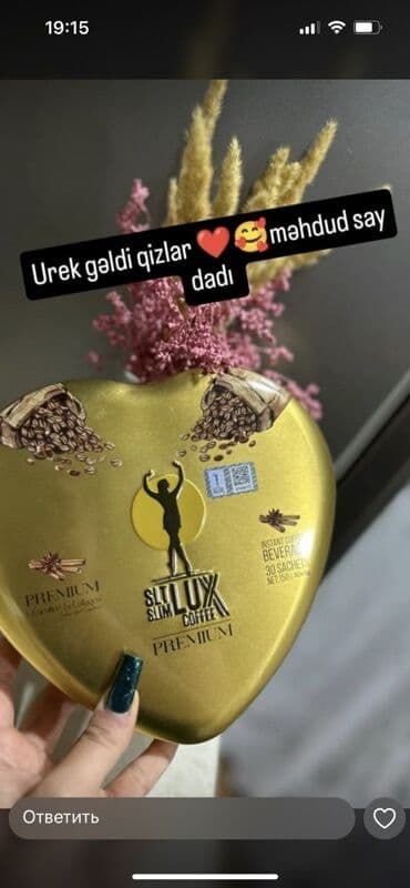 qəhvə satışı: Qızılı rəngdə, ürək formalı qablaşmada olan SLimLux Coffee. Tərkibində — 1