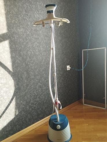 ventilyator su ile: Philips buxarlı geyim ütüləyicisi (ständli geyim steamer) - Şaquli — 1