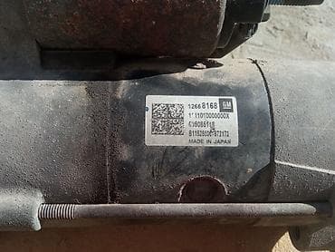 starter opel vectra: Şəkildə gördüyün detal GM (General Motors) startyorudur. Etiketdə — 2