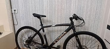 velosipedler: Toba markalı şəhər/fitness tipli velosiped. Yüngül və zərif görünüşlü — 7