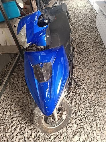 pirus diski: Mavi rəngli şəhər skuter/motoroller. Texniki və dizayn — 2