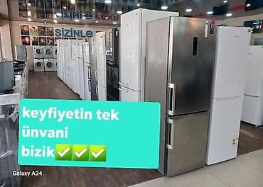 Məişət texnikası mağazasında müxtəlif model soyuducular və — 1