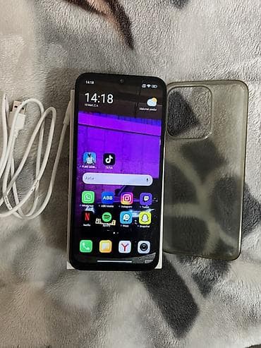 iphone 17 pro max qiyməti: Redmi 128 GB, rəng - Qara, Barmaq izi, Face ID — 1