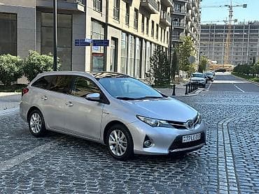 ford transit olculeri: Toyota Auris Touring Sports Hybrid – gümüş rəngli, universaldır — 3