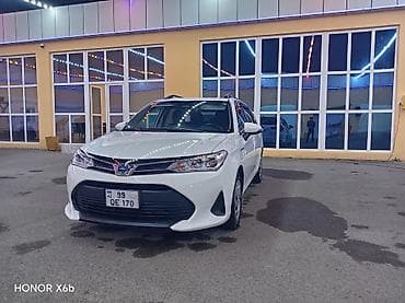 ev maşın: Toyota Corolla Fielder Hybrid, ağ rəng, universal kuzov. Xarici — 4