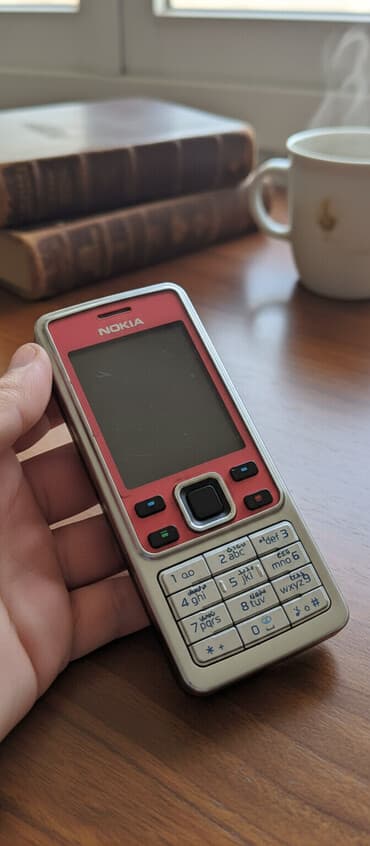 telefon zəngi üçün mp3 yukle: Nokia 6300 4G, 4 GB, rəng - Boz, Düyməli — 1